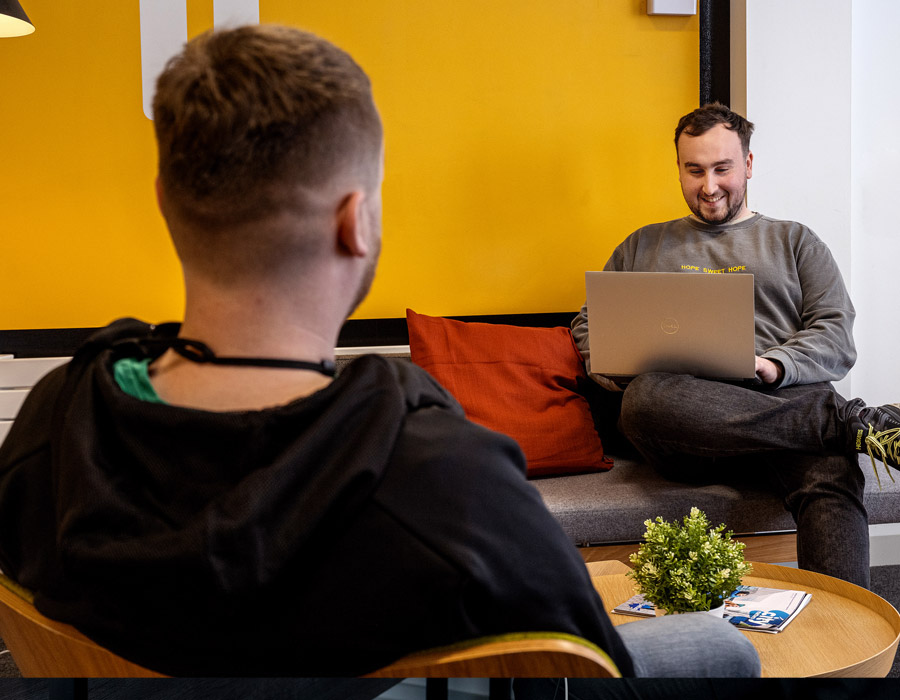 People working in the lounge at the Innovation Factory