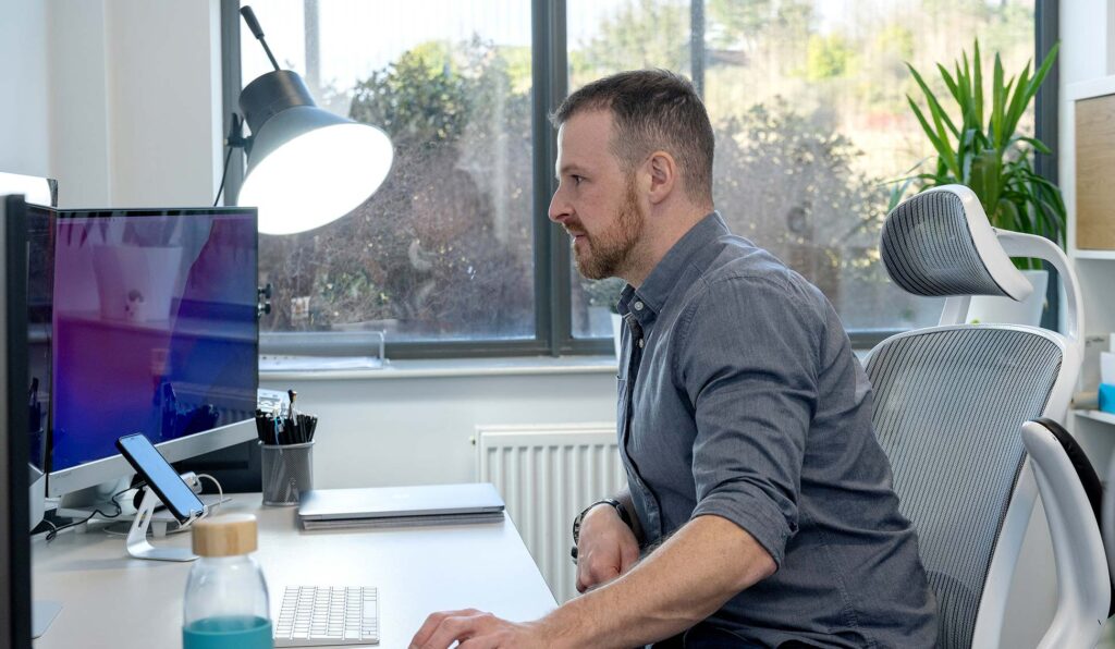 Person Working at their Office Desk
